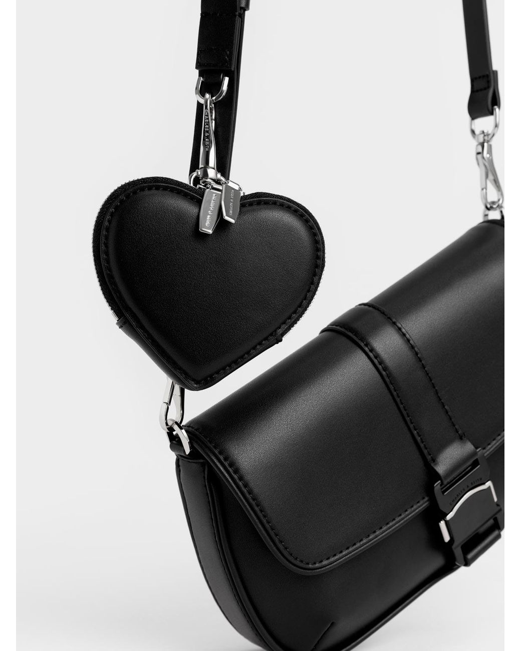 CHARLES & KEITH Heart-shaped crossbody bag in black as seen on