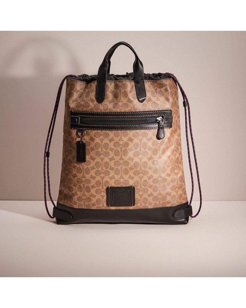 COACH Restored Academy Drawstring Backpack In Signature Canvas in Brown