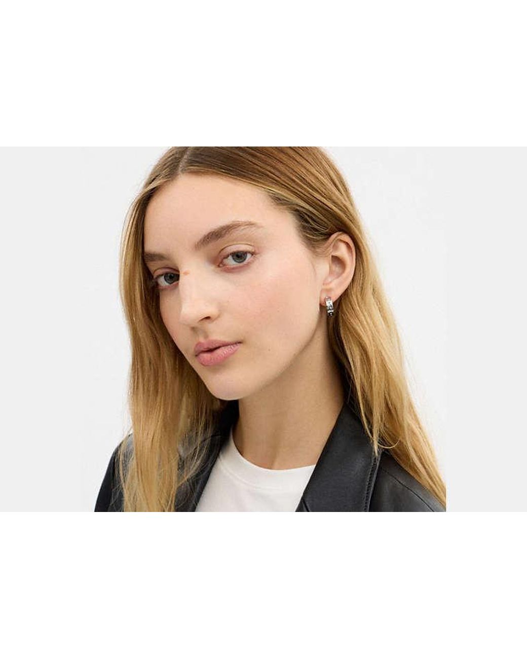 COACH Black Repeated C Huggie Earrings