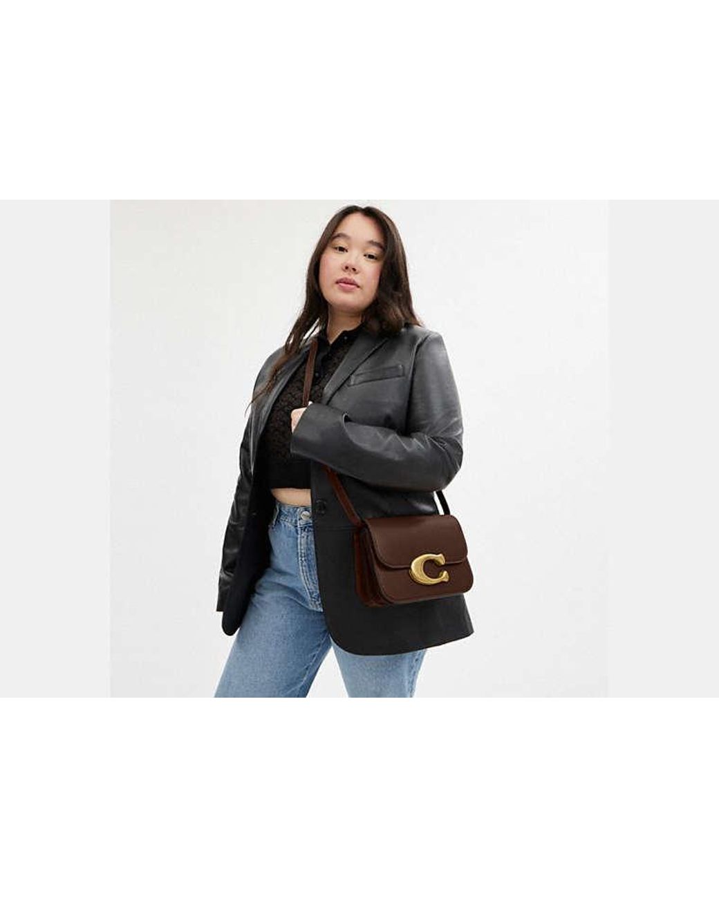 COACH Black Idol Bag (Brass/) Shoulder Handbags