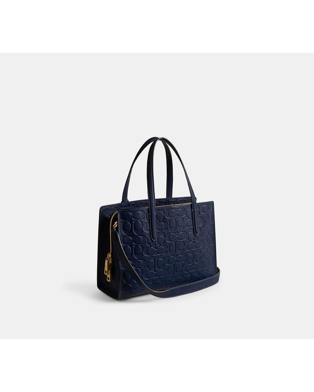 Coach charlie deals carryall with rivets