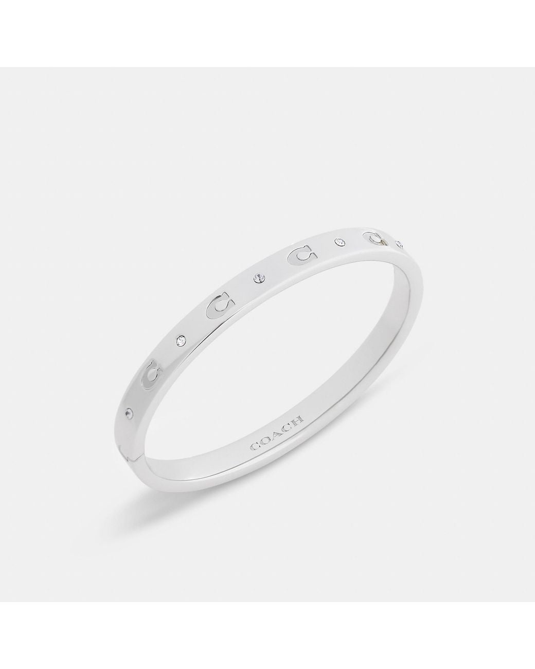 COACH White Repeated C Hinged Bangle Bracelet