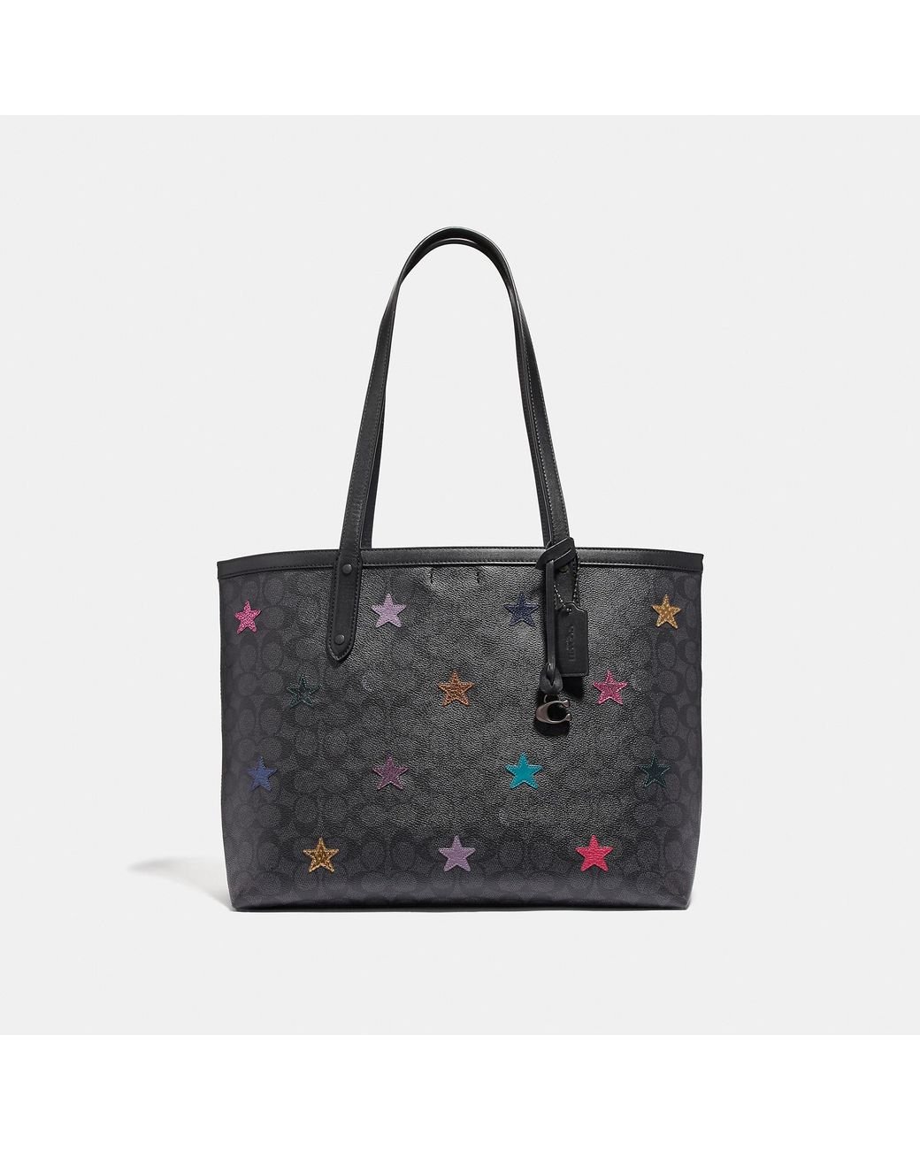COACH Central Tote In Signature Canvas With Star Applique And Snakeskin  Detail in Black | Lyst