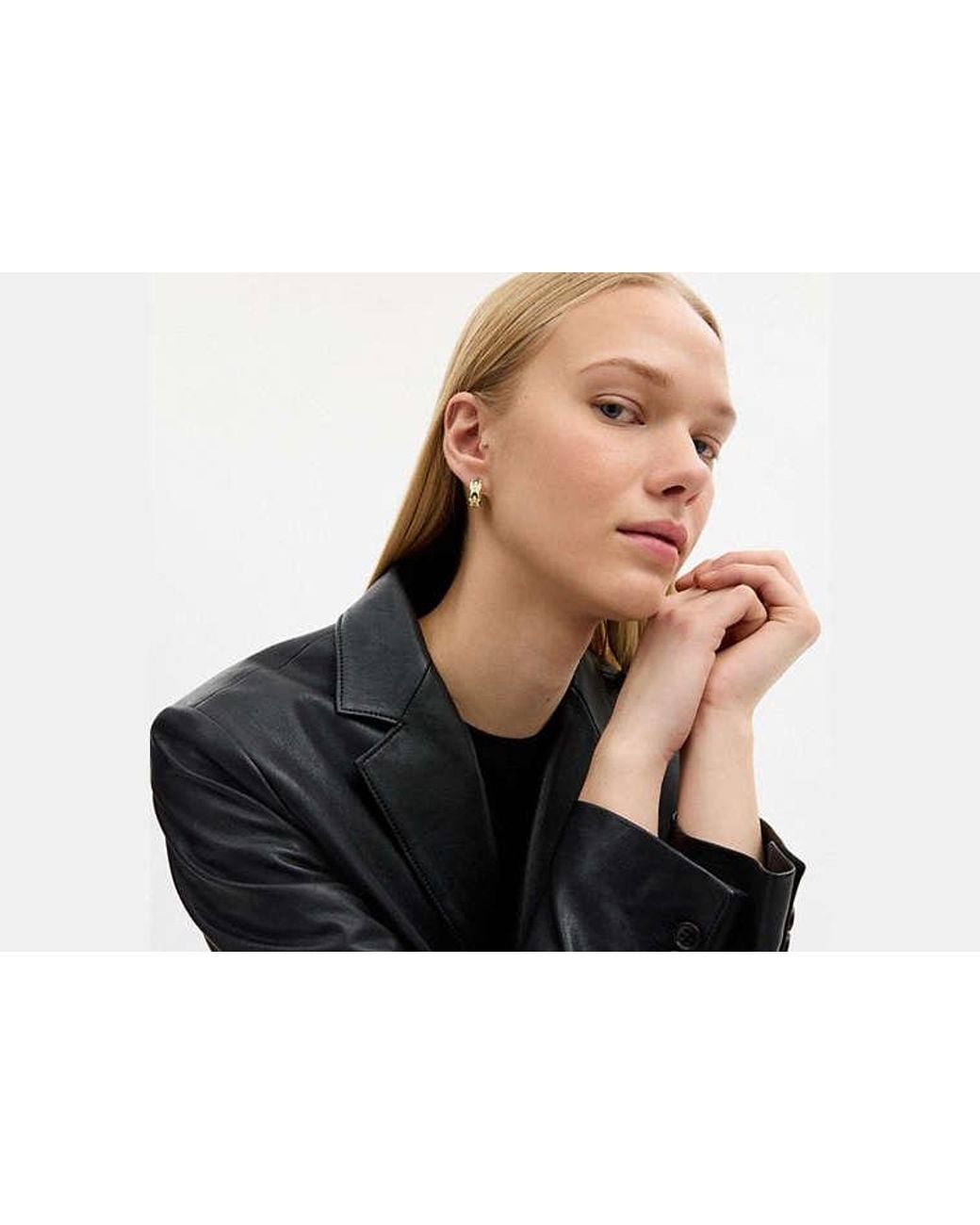 COACH Black Repeated C Huggie Earrings