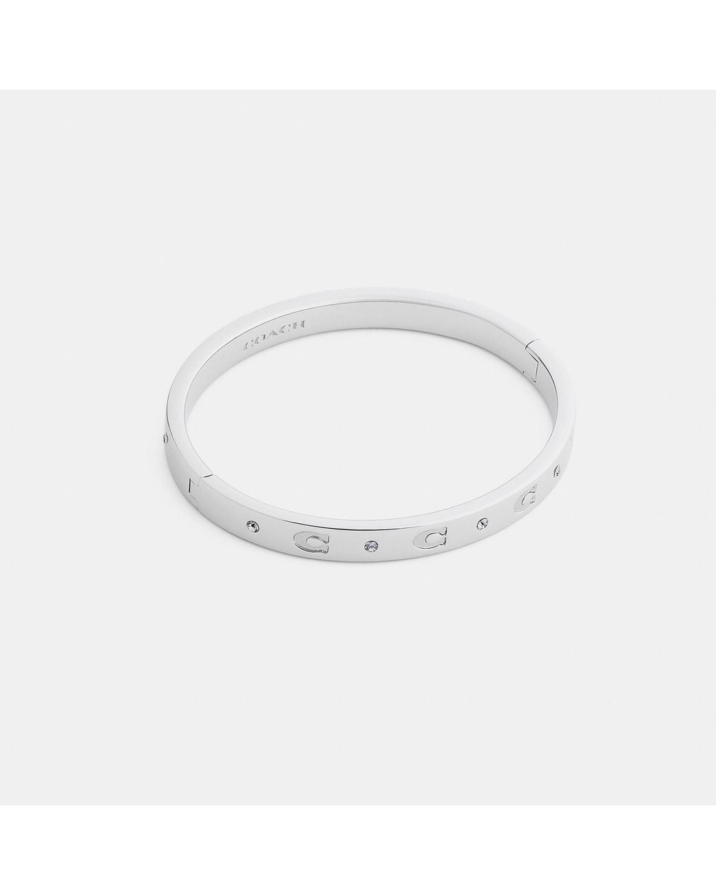 COACH White Repeated C Hinged Bangle Bracelet