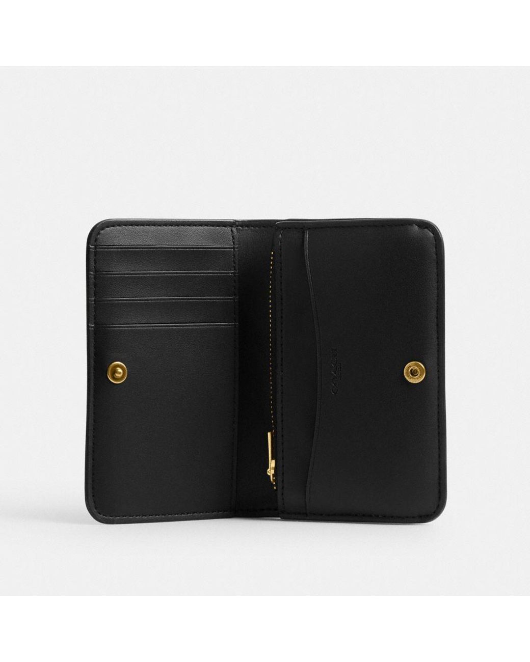 Essential Slim Case Wallet from Coach: A Comprehensive Guide