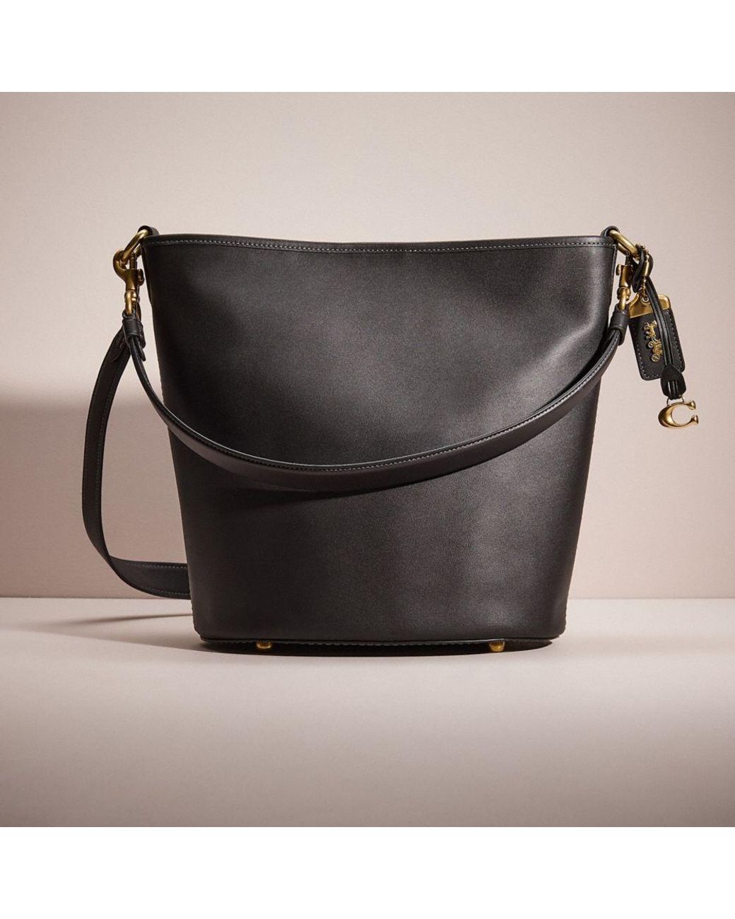 COACH Restored Dakota Bucket Bag in Black | Lyst