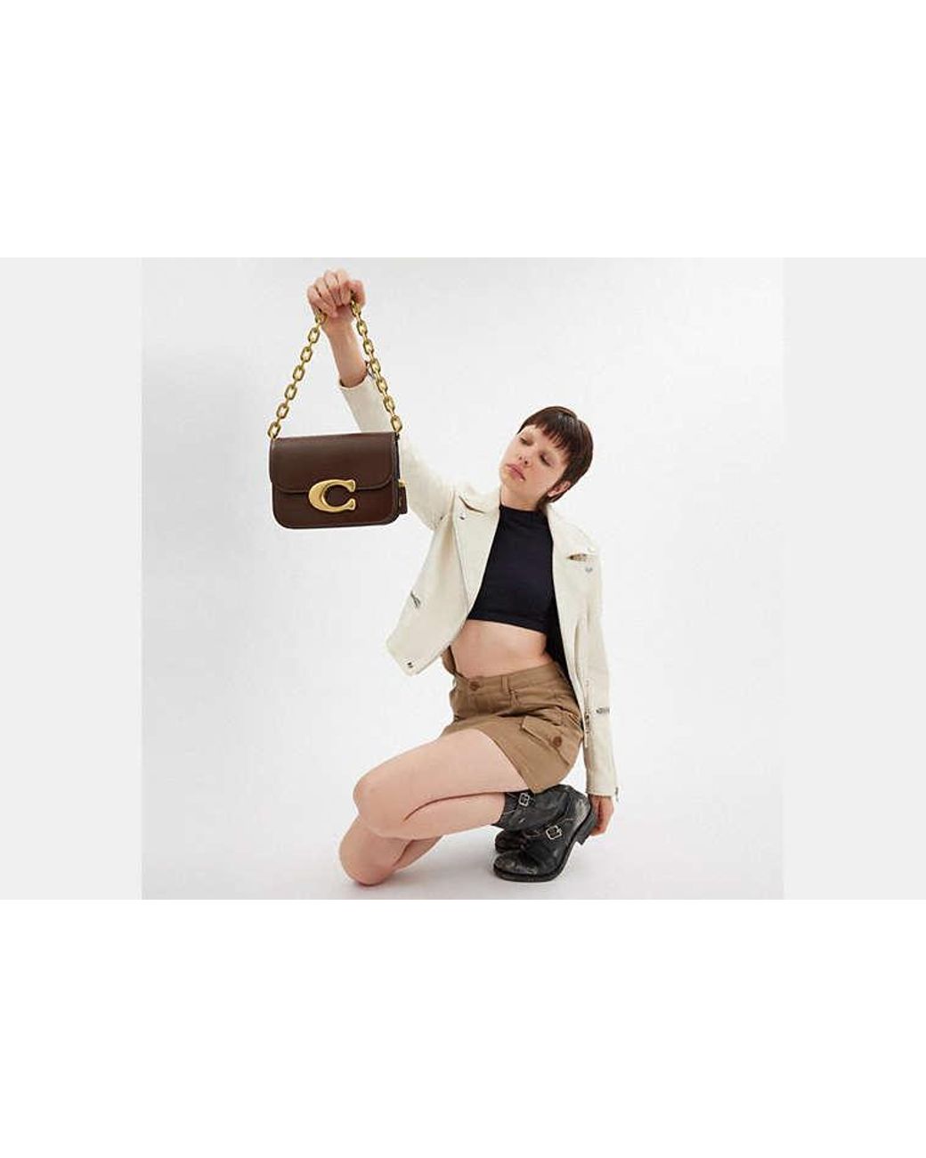 COACH Black Idol Bag (Brass/) Shoulder Handbags