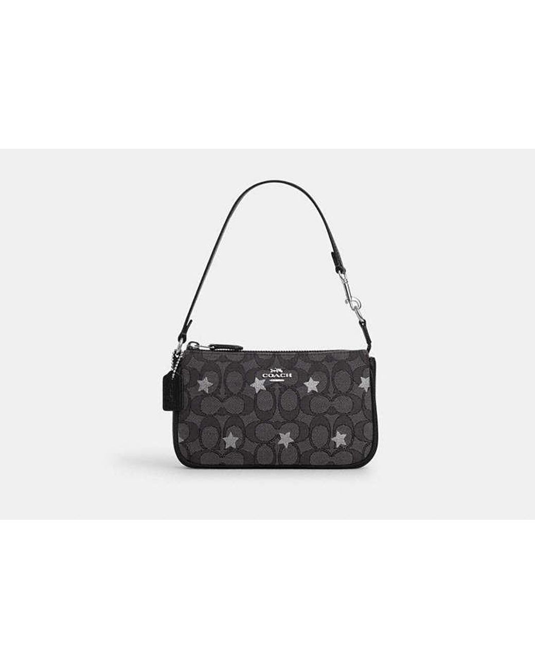 Nolita 19 in signature canvas with snowflake print hotsell