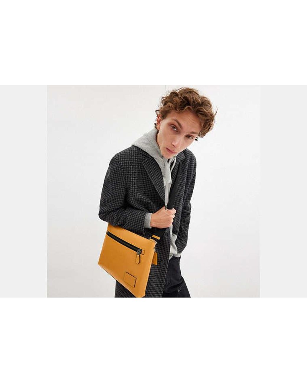 coach-Yellow-Carrier-Zip-