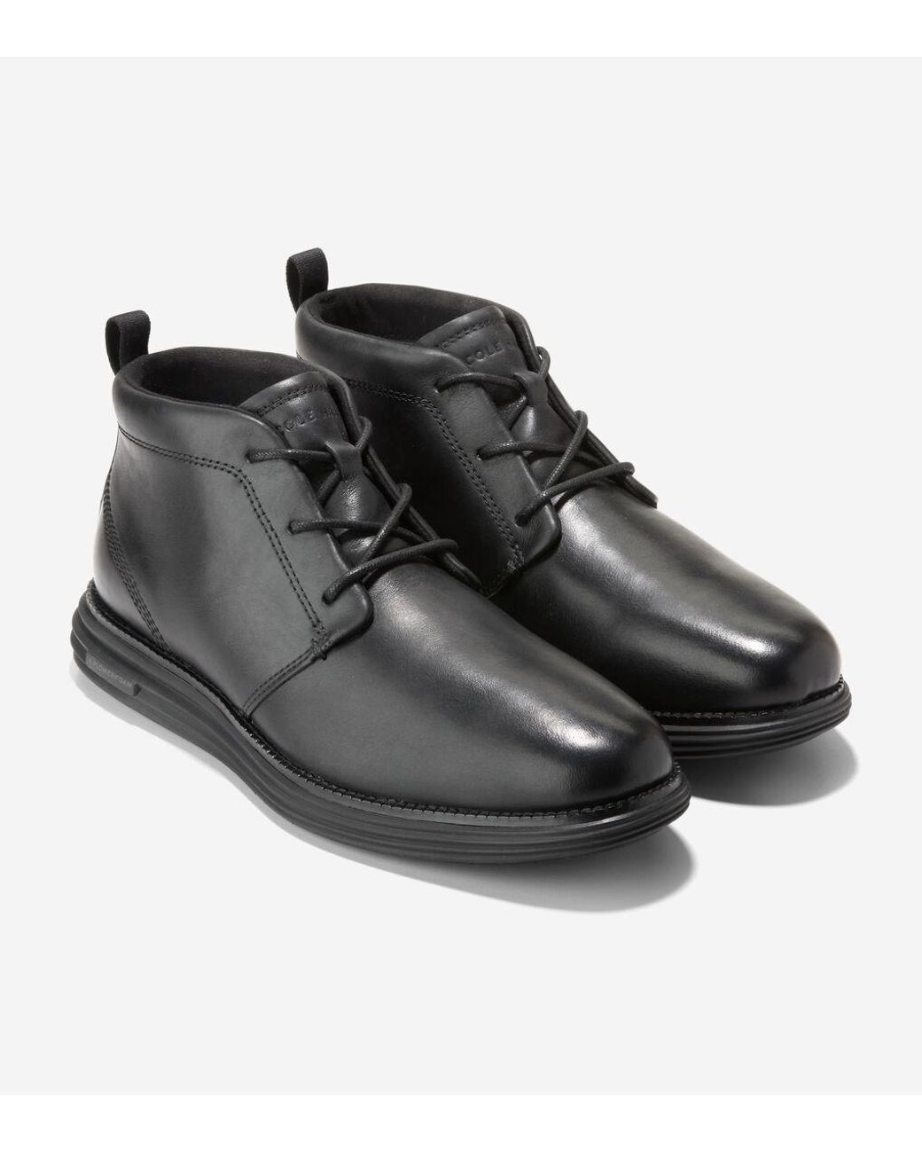 Black cole haan boots sales