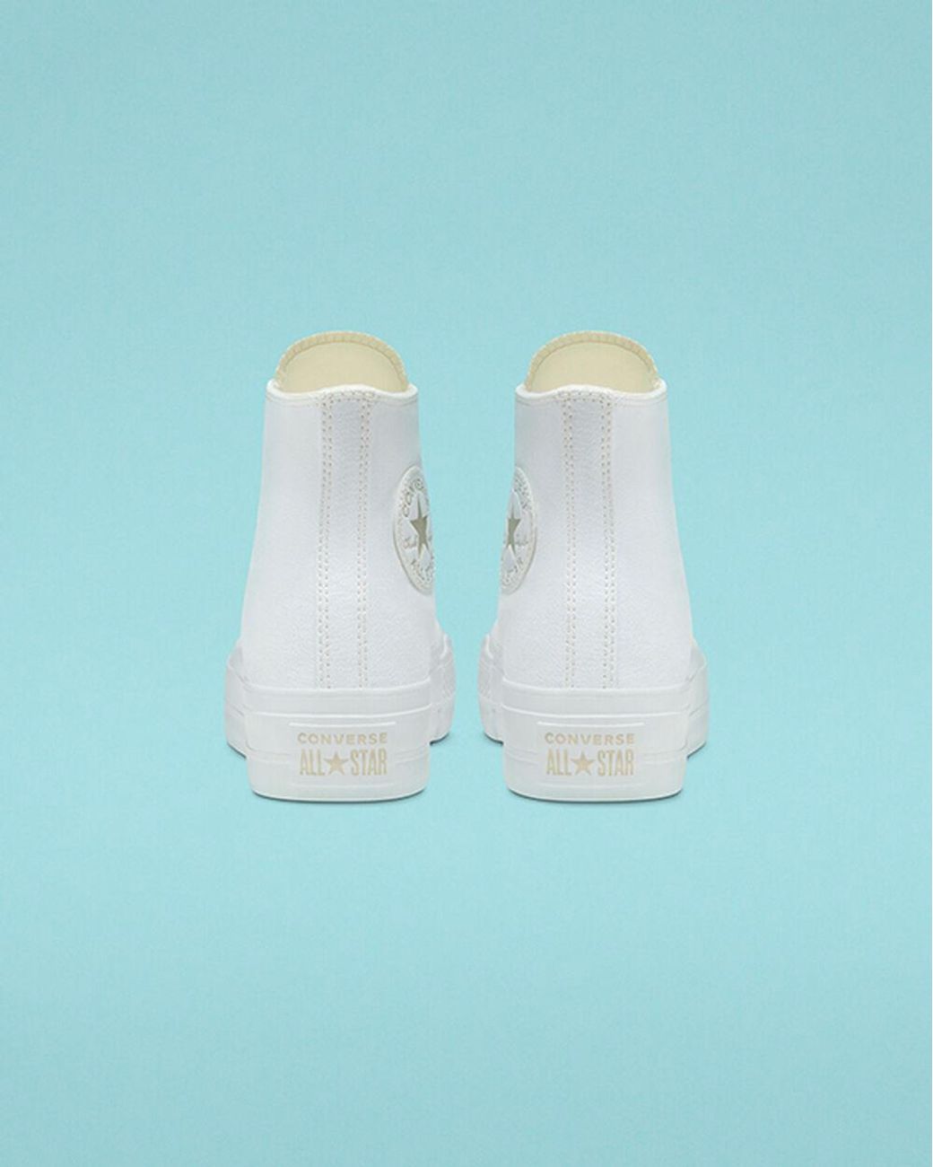 elevated gold platform converse