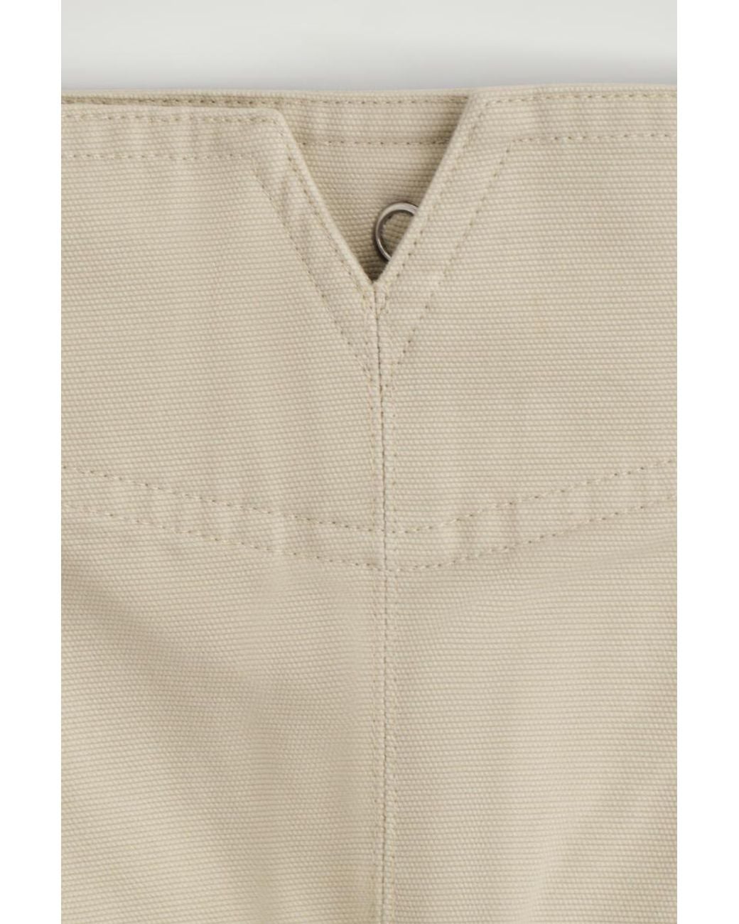 COS Natural Pleated Buckle-Detail Mini Skirt