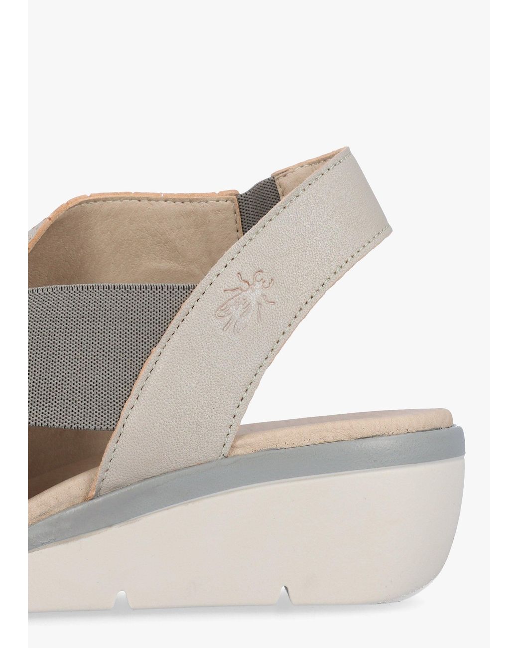 Fly London White Nisi Perforated Leather Low Wedge Sandals
