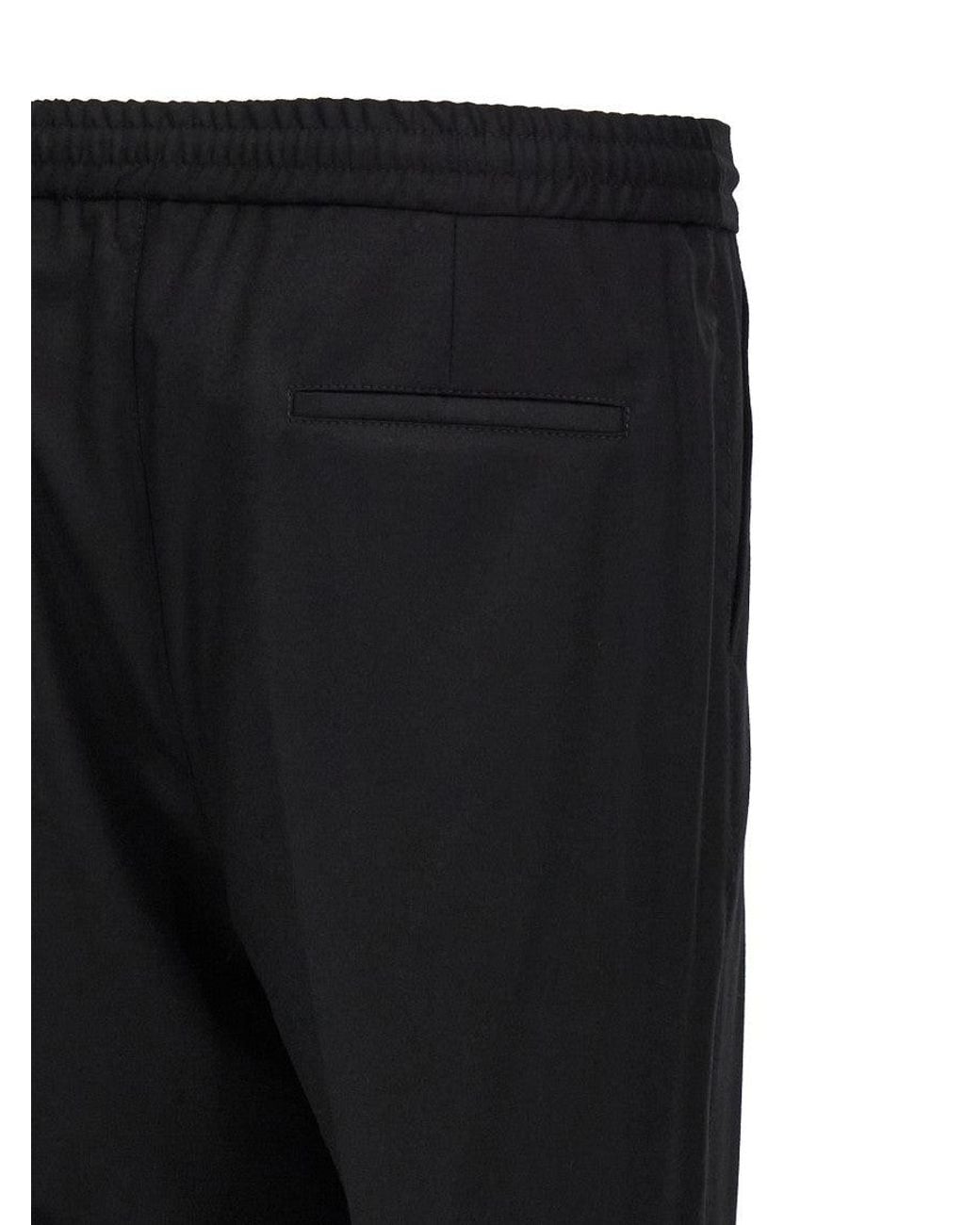 Brunello Cucinelli Black Leisure Fit Trousers for men