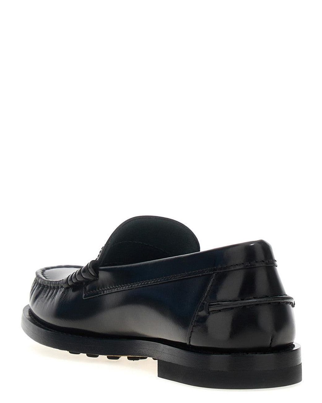 Tod's Black Flat Shoes