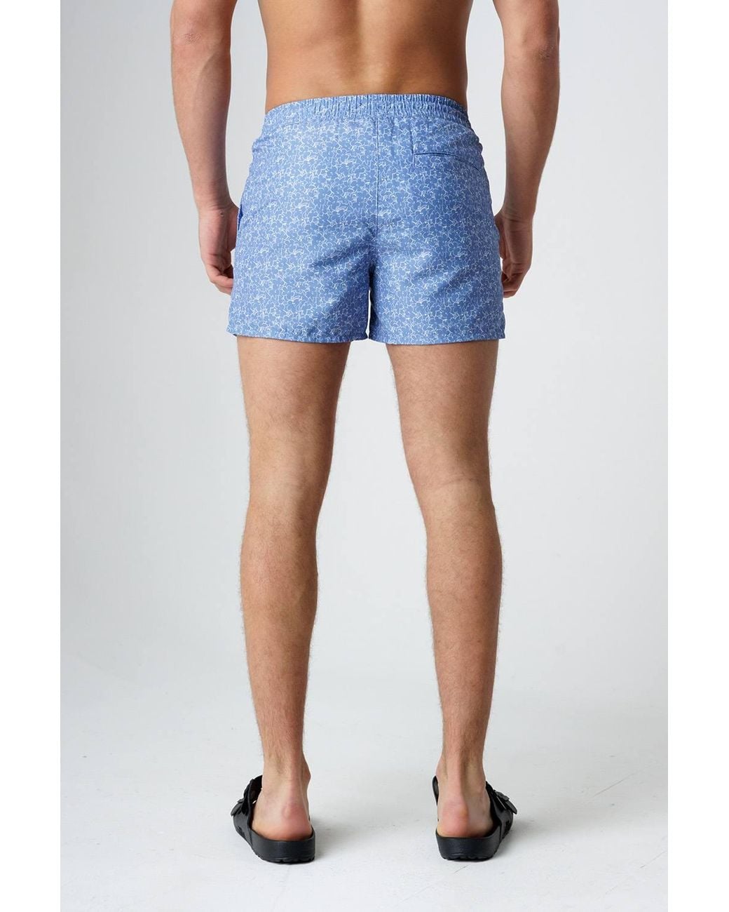 Influence Blue Elasticated Floral Print Swim Shorts for men