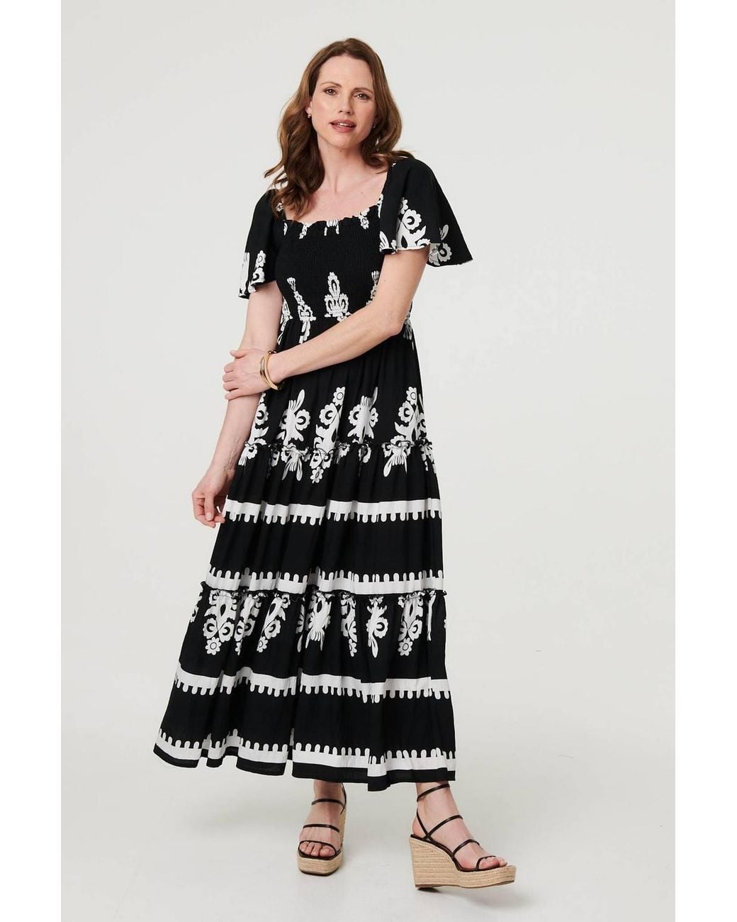 Izabel London White Ikat Print Short Angel Sleeve Maxi Dress
