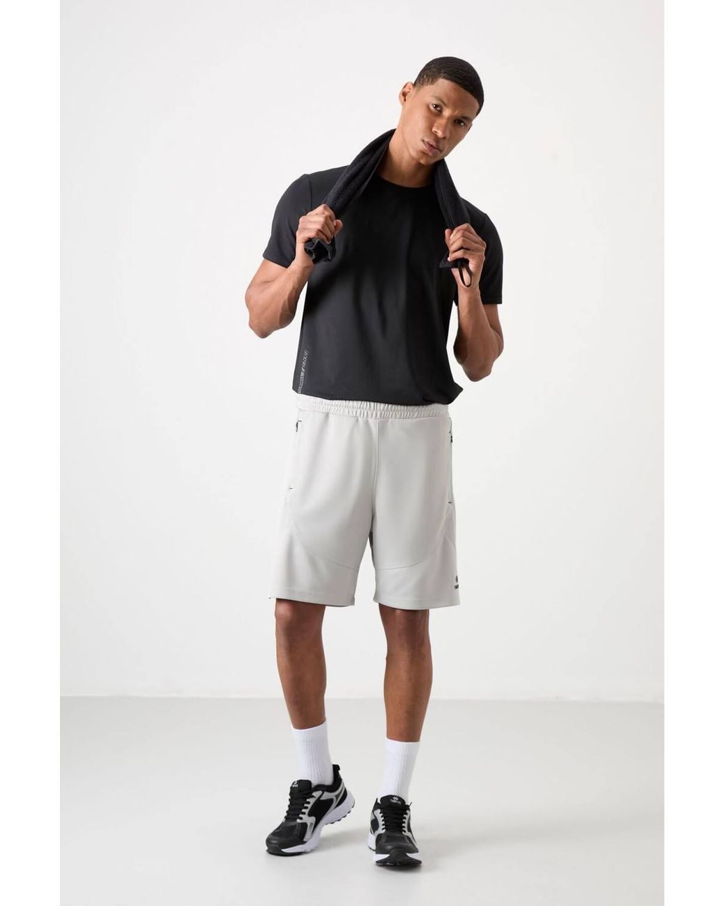 TOMMY LIFE White Solid Knit Sweat Shorts for men