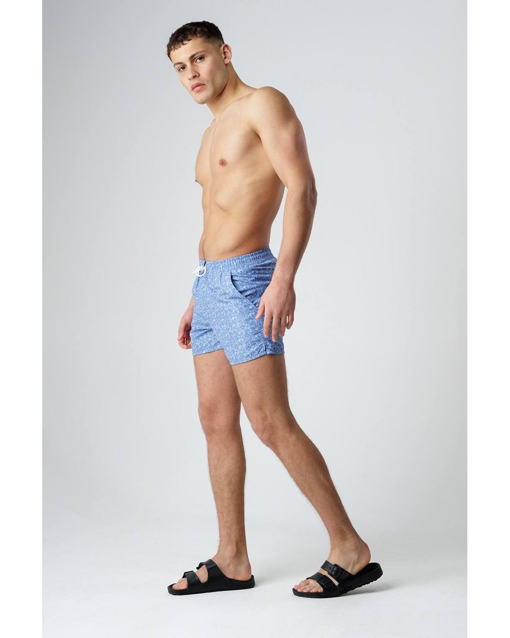 Influence Blue Elasticated Floral Print Swim Shorts for men