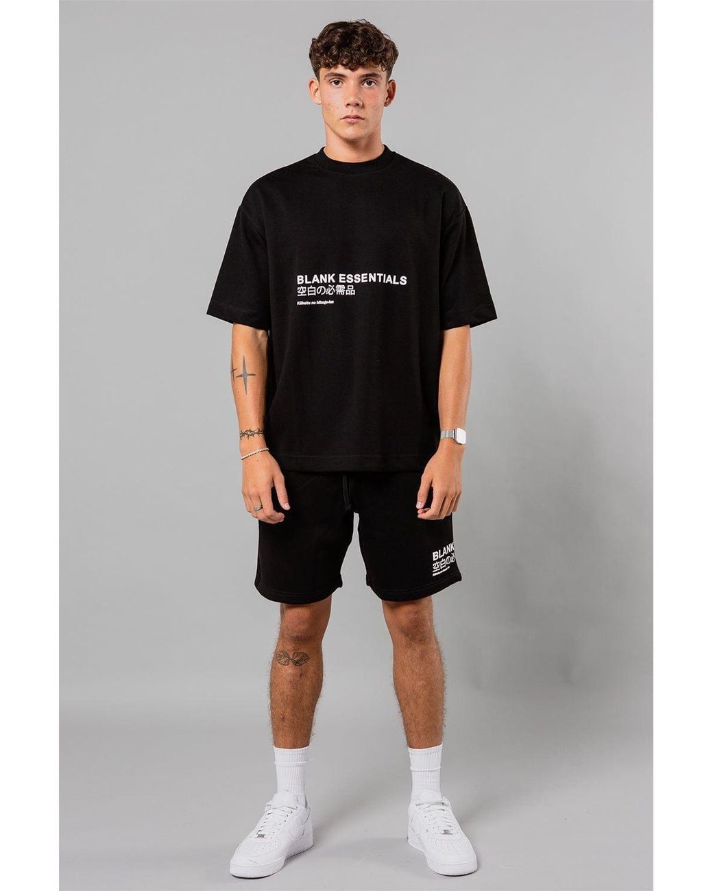 Blank Essentials Black Cotton Blend Shorts With Graphic Print for men