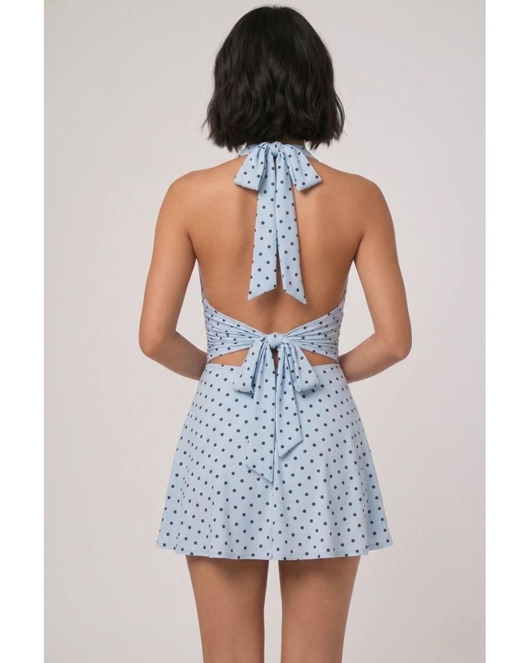 Stylewise Blue Polka Dot Halter Neck Tie Knot Open Back Mini Dress