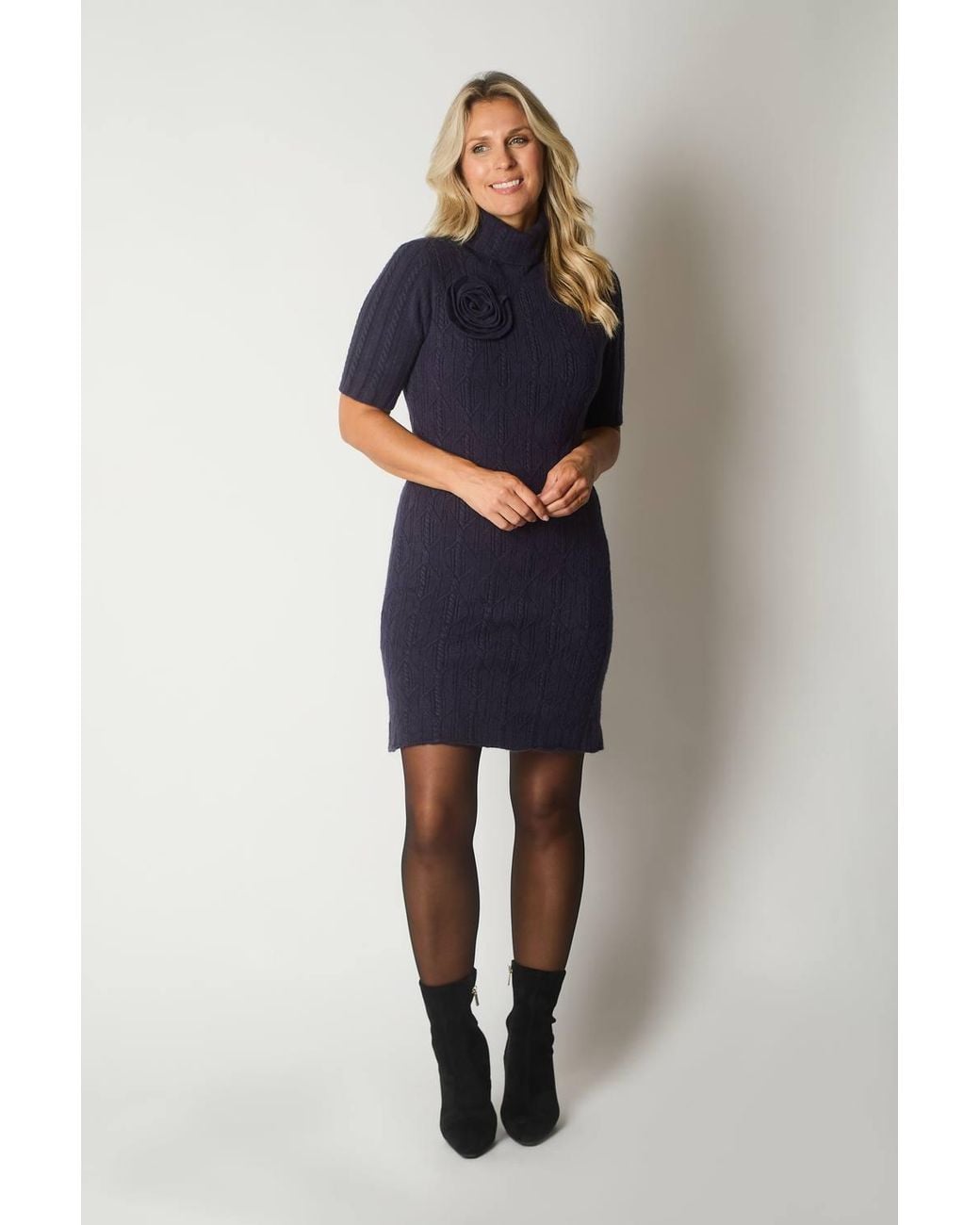 Solo Blue Knit Turtleneck Dress With Rosette Detail