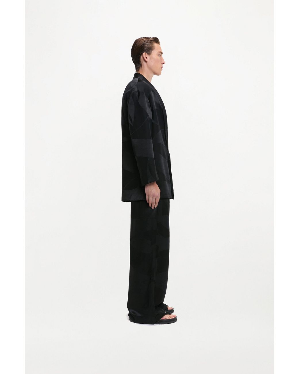 delos.land Black Clement Trousers Monogram for men