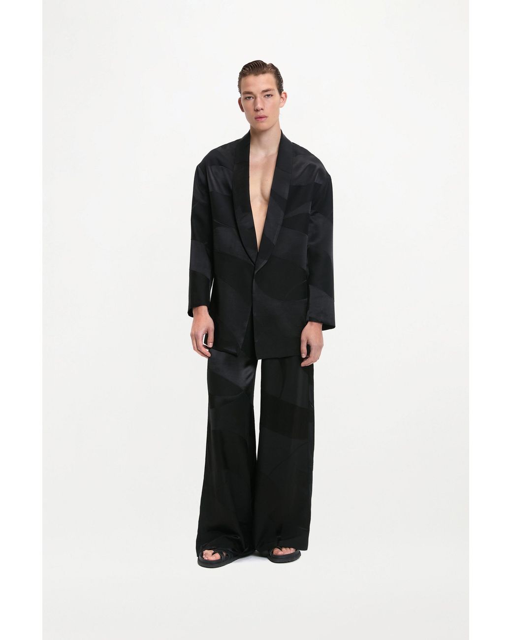delos.land Black Clement Trousers Monogram for men