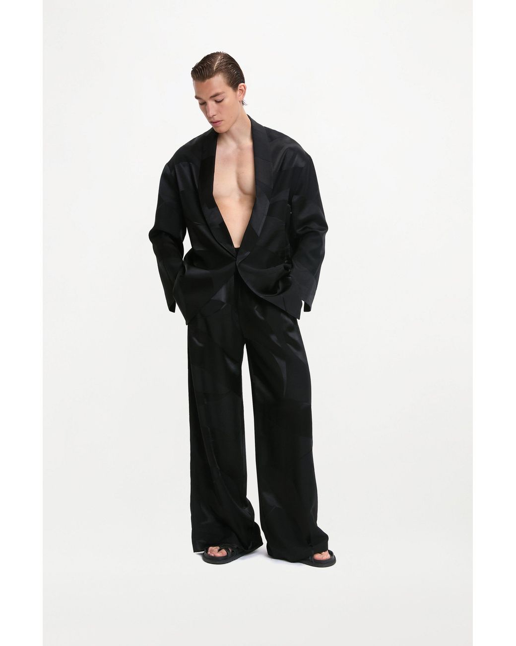 delos.land Black Clement Trousers Monogram for men