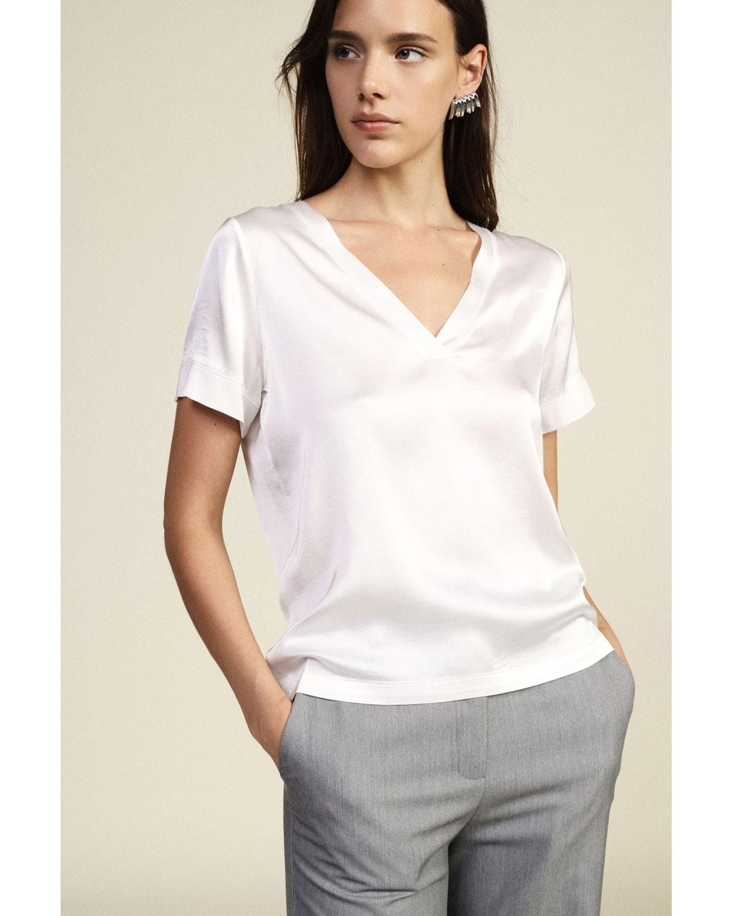 T-Shirt Con Scollo A V E Maniche Corte Risvoltate di Dixie in White