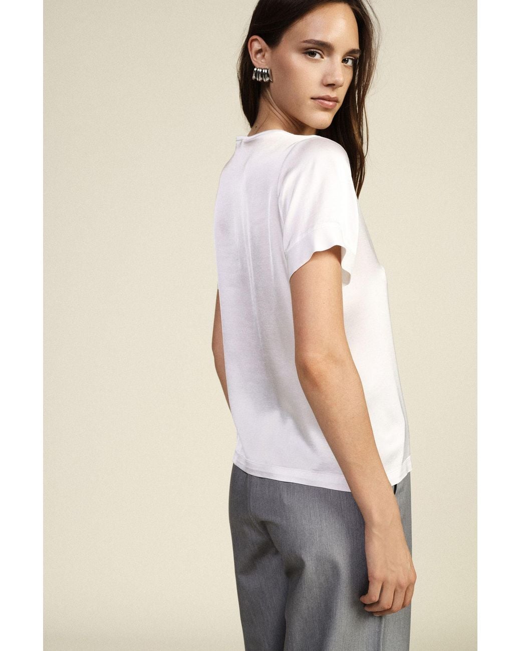 T-Shirt Con Scollo A V E Maniche Corte Risvoltate di Dixie in White