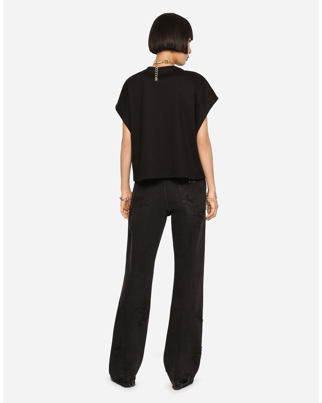 Dolce & Gabbana Black Flared Jeans With Ripped Details