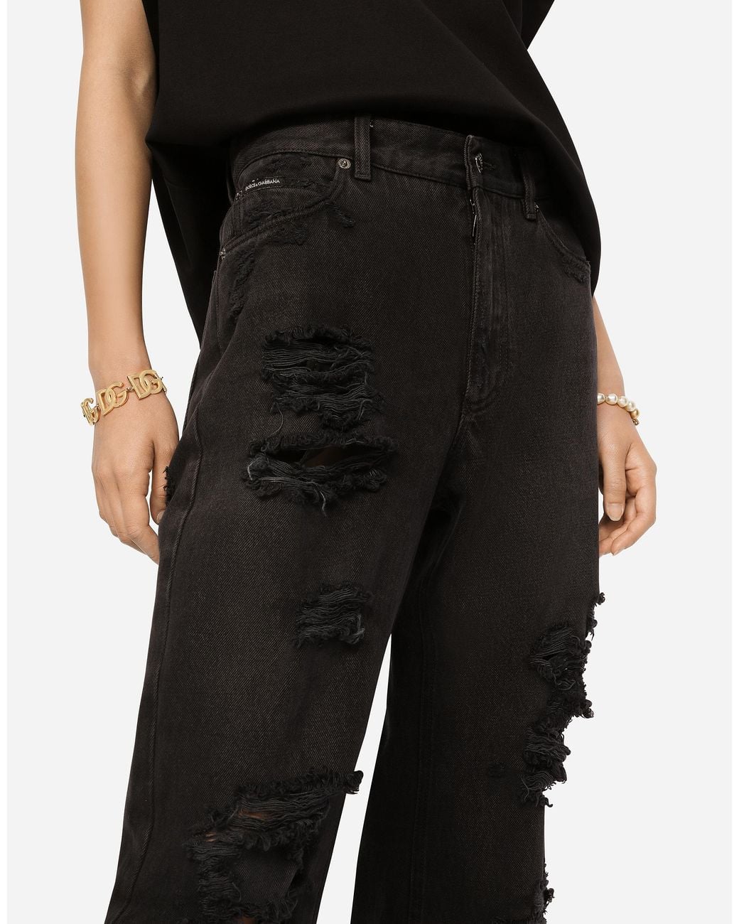 Dolce & Gabbana Black Flared Jeans With Ripped Details