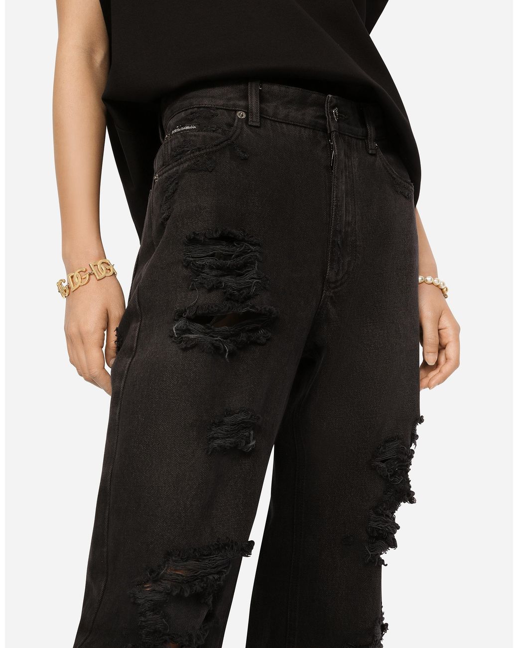 Dolce & Gabbana Black Flared Jeans With Ripped Details