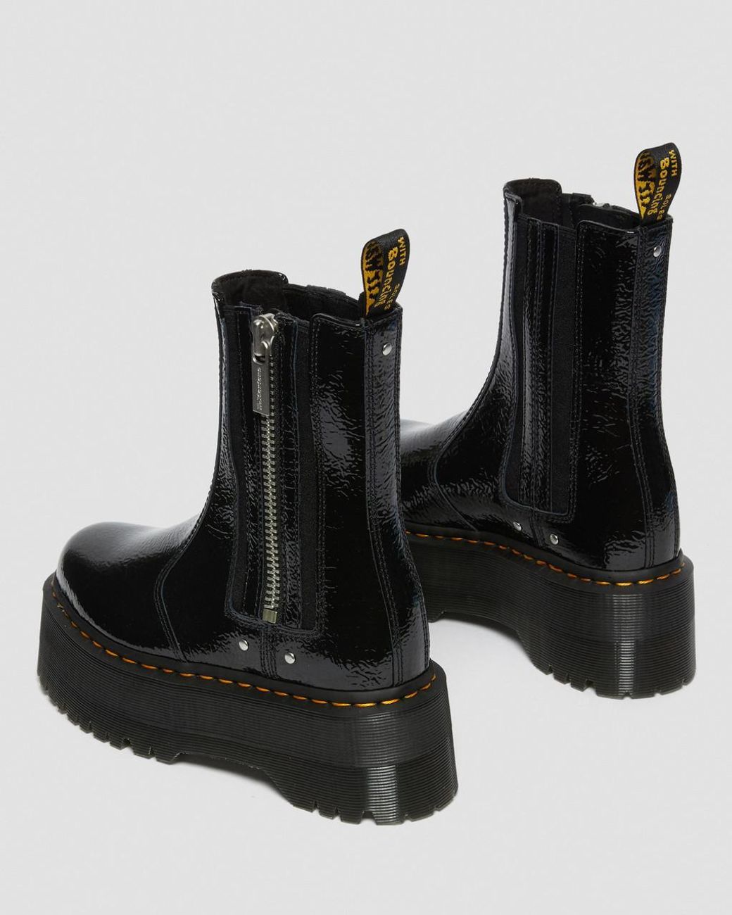https://www.lyst.com/shoes/dr-martens-2976-max-distressed-patent-chelsea-platform-boots/