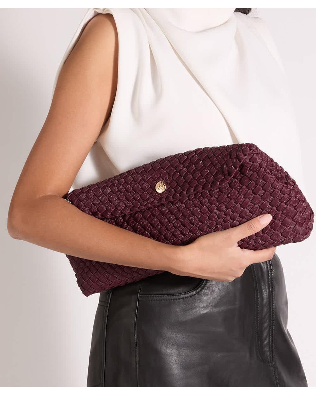 Dune Purple Encourage Woven Clutch With Cross Body Strap Bag