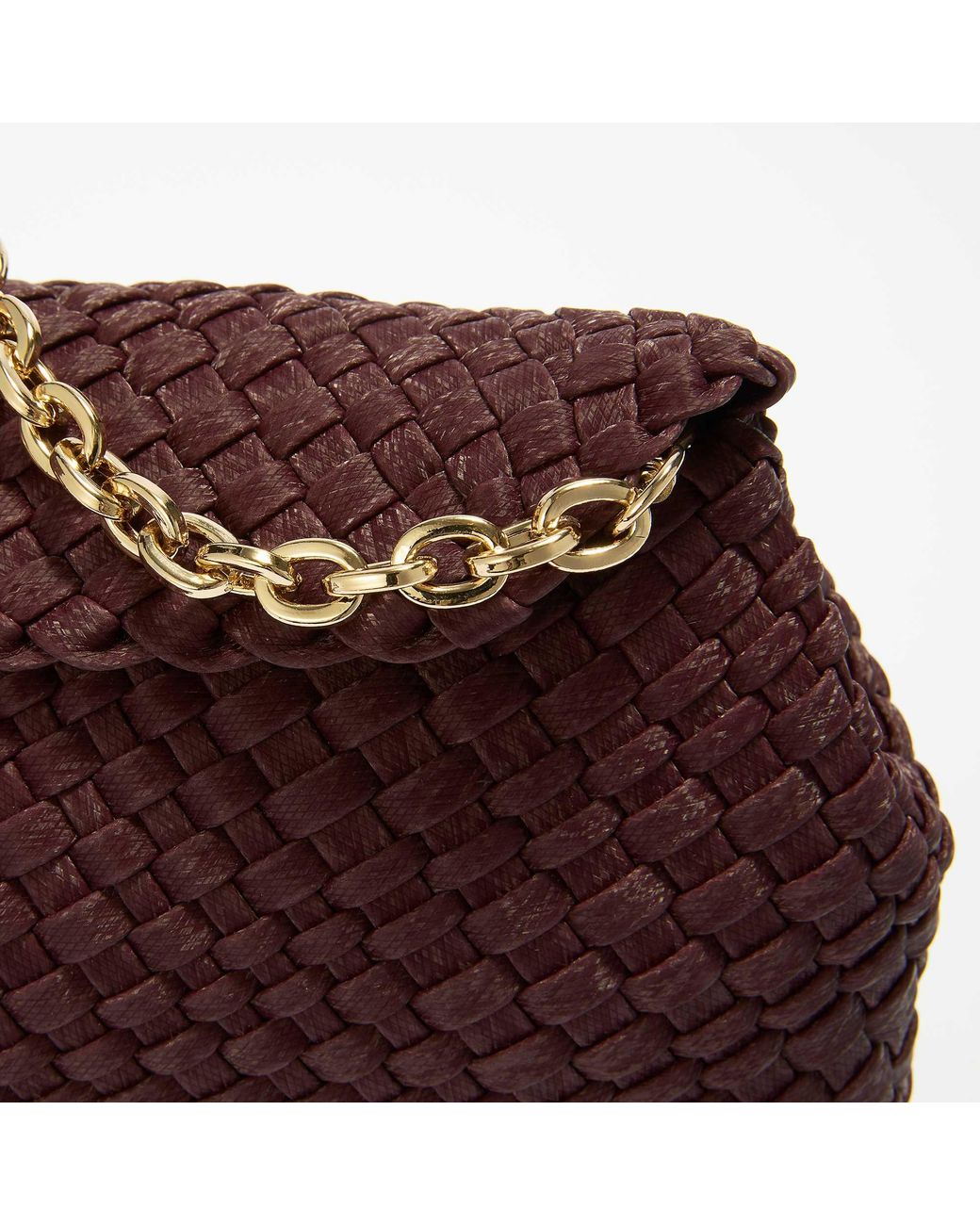 Dune Purple Encourage Woven Clutch With Cross Body Strap Bag
