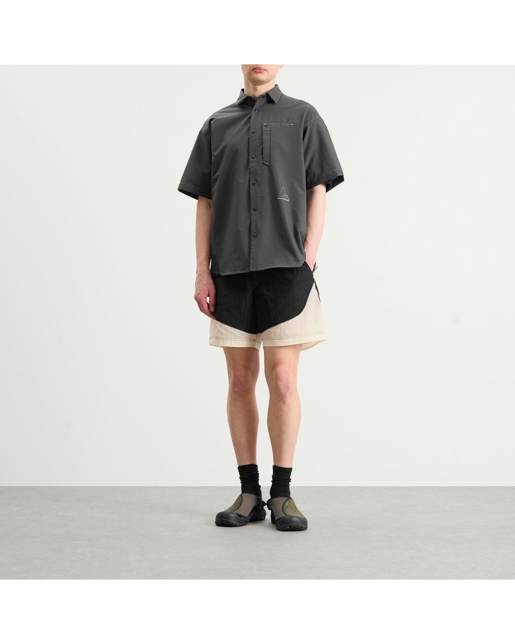 And Wander Black X Roa Ripstop Wind Shorts for men