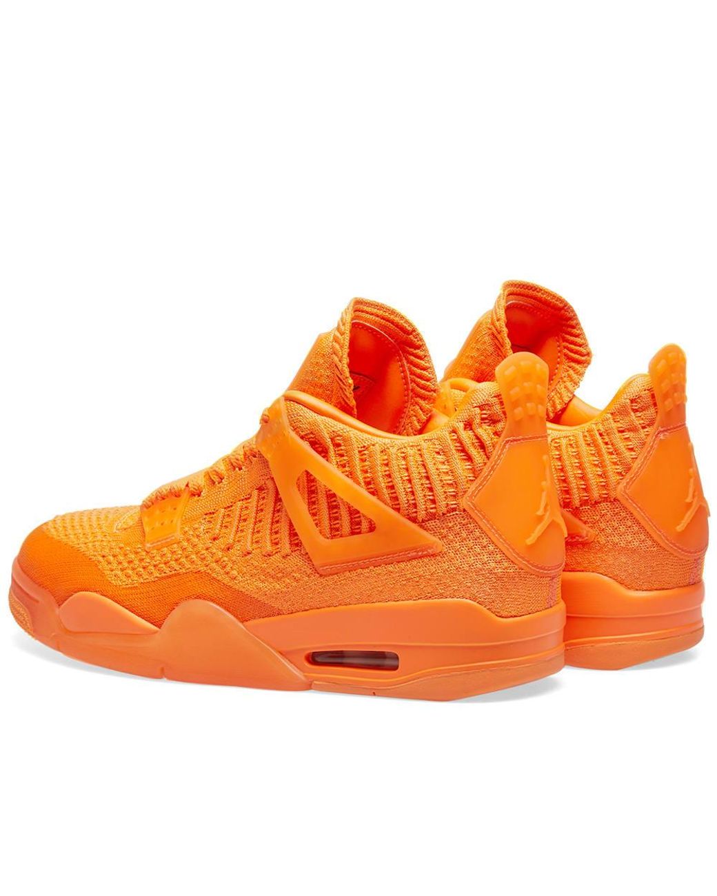 dormir Evaluación morfina Nike Air Jordan 4 Retro Flyknit in Orange for Men | Lyst