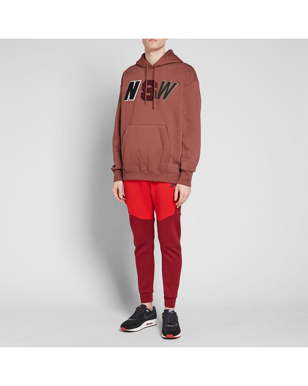 nike sportswear tech fleece joggers red