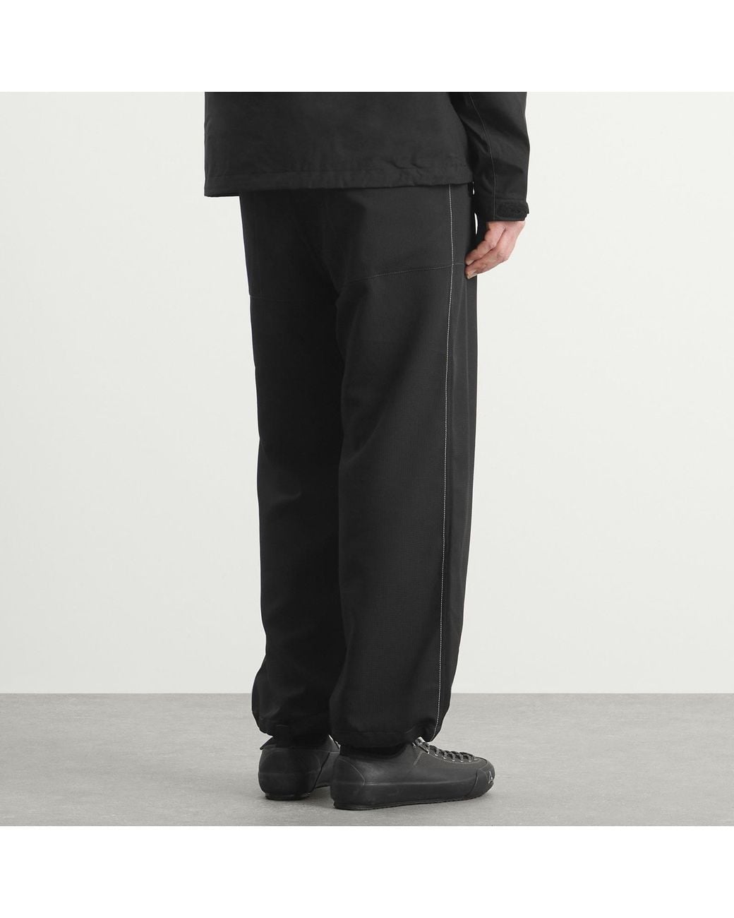 And Wander Black Vent Trousers for men