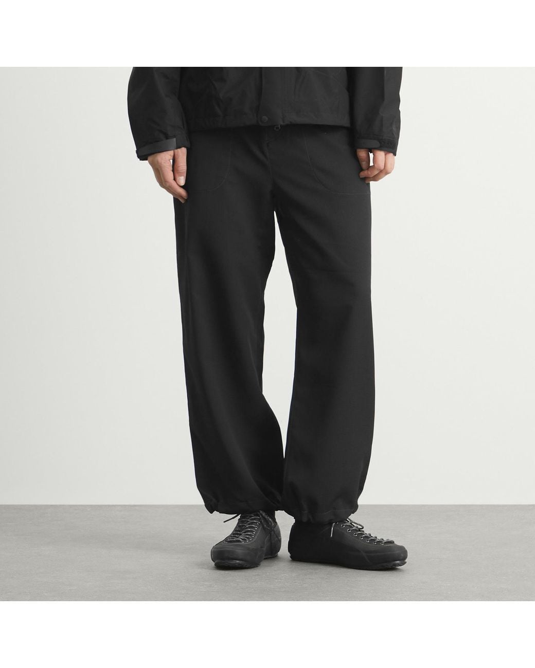 And Wander Black Vent Trousers for men