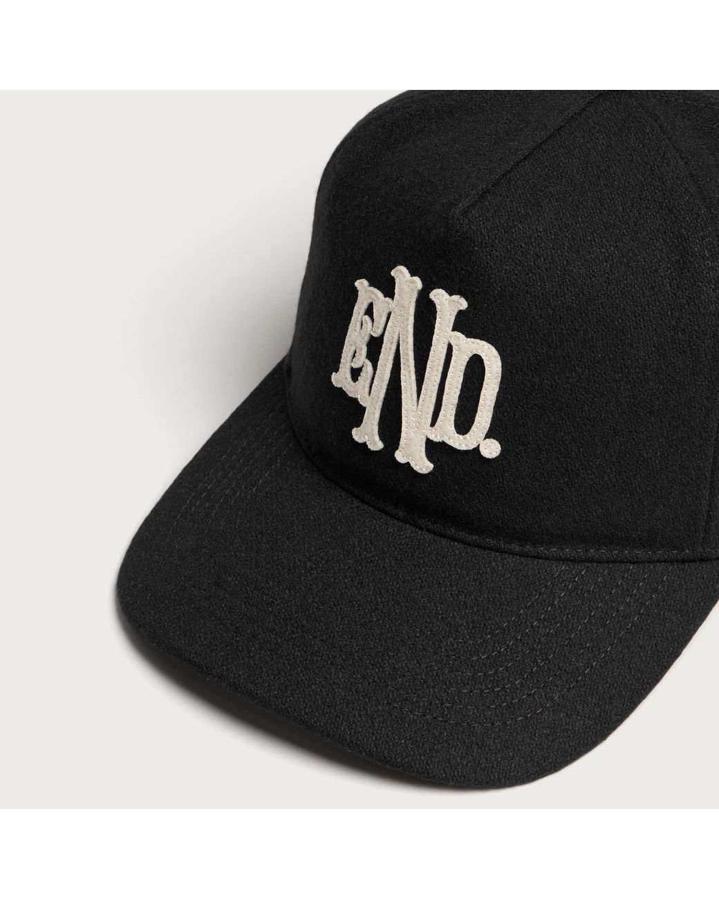 END. Black Monogram Hitch Lc Cap