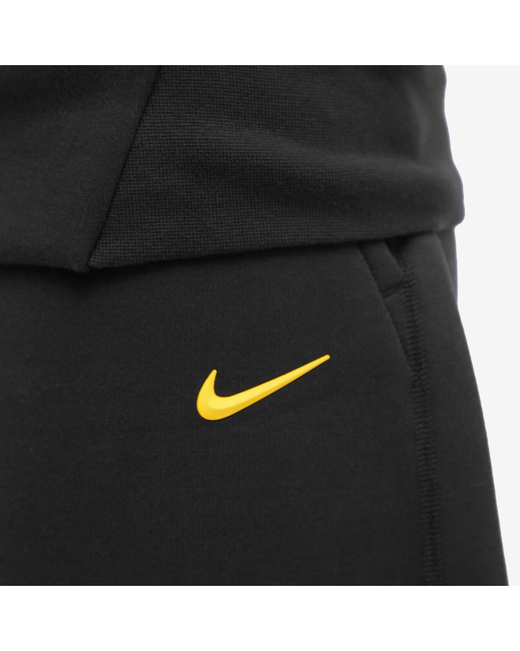 black and gold tech fleece
