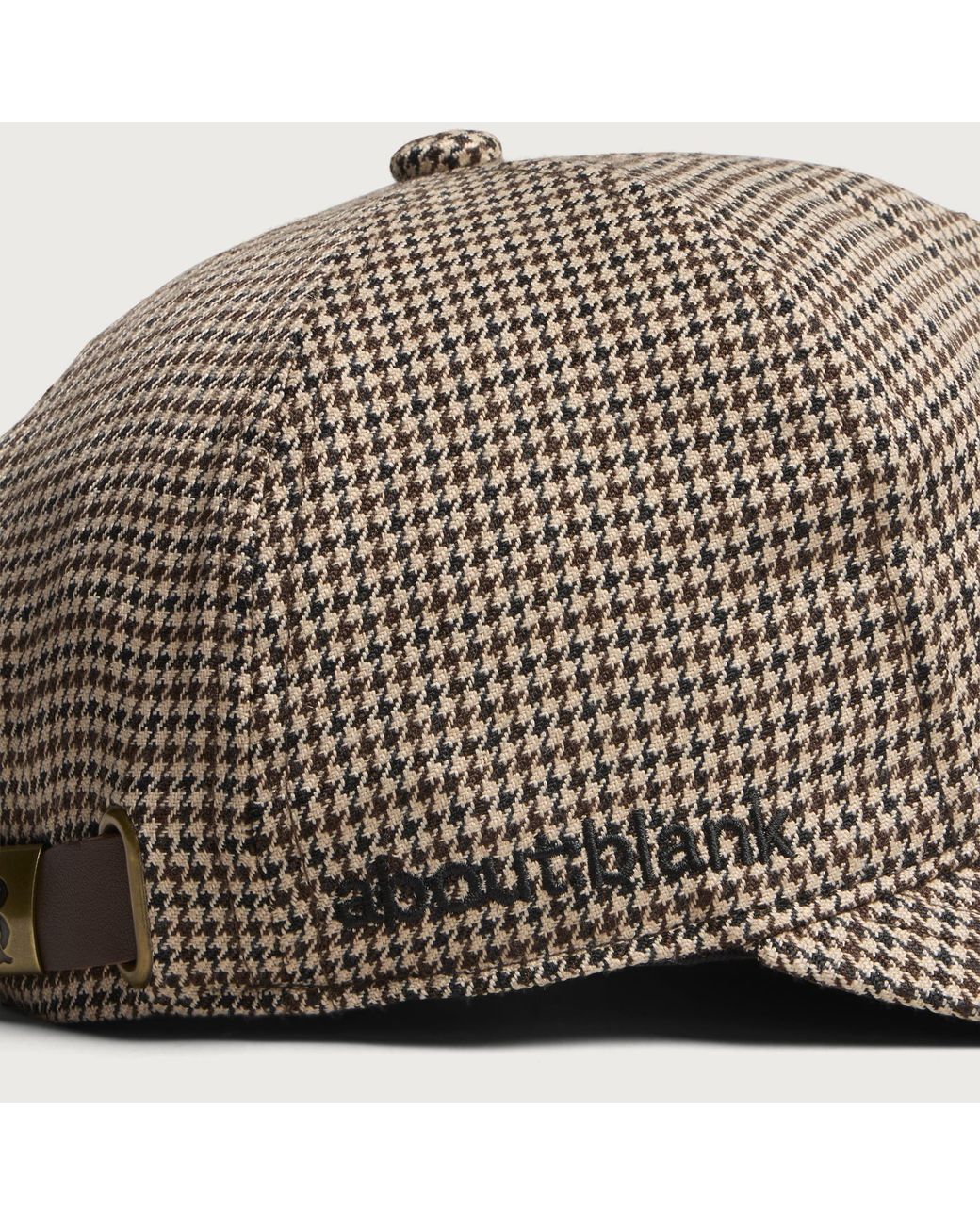 About Blank Brown Monogram Puppy Tooth Cap for men
