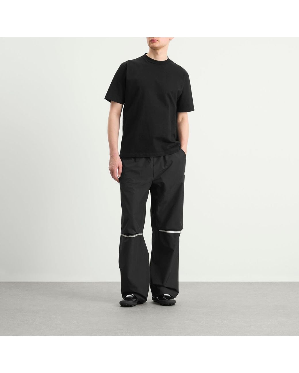 New Balance Elusive Shell Pant in Black for Men | Lyst
