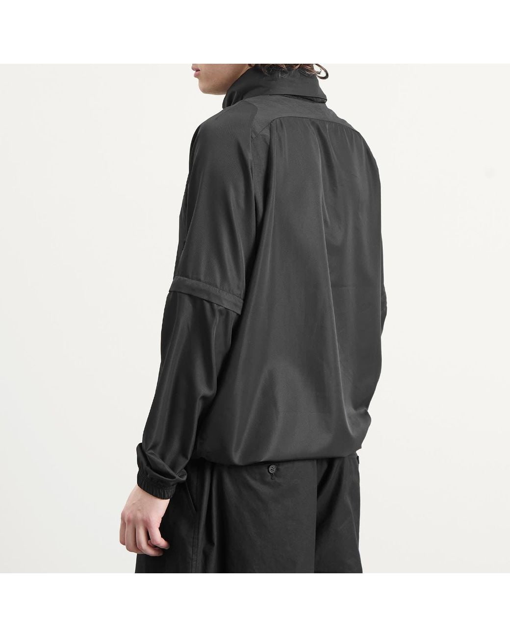 Umbro Black Zip Off Sleeve Wind Jacket for men