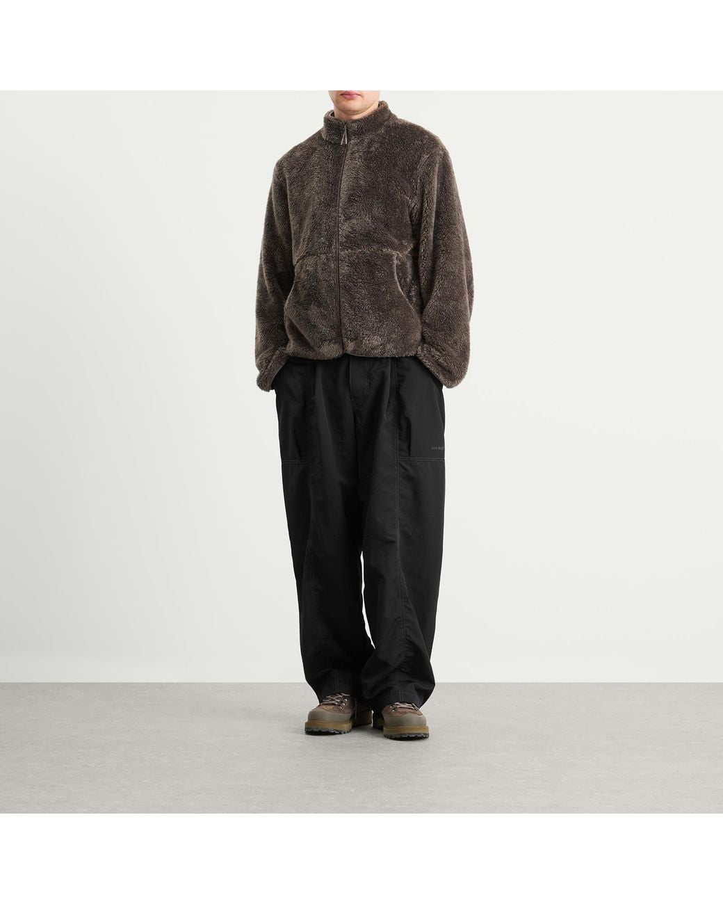 And Wander Black Crinkled Nylon Trousers for men