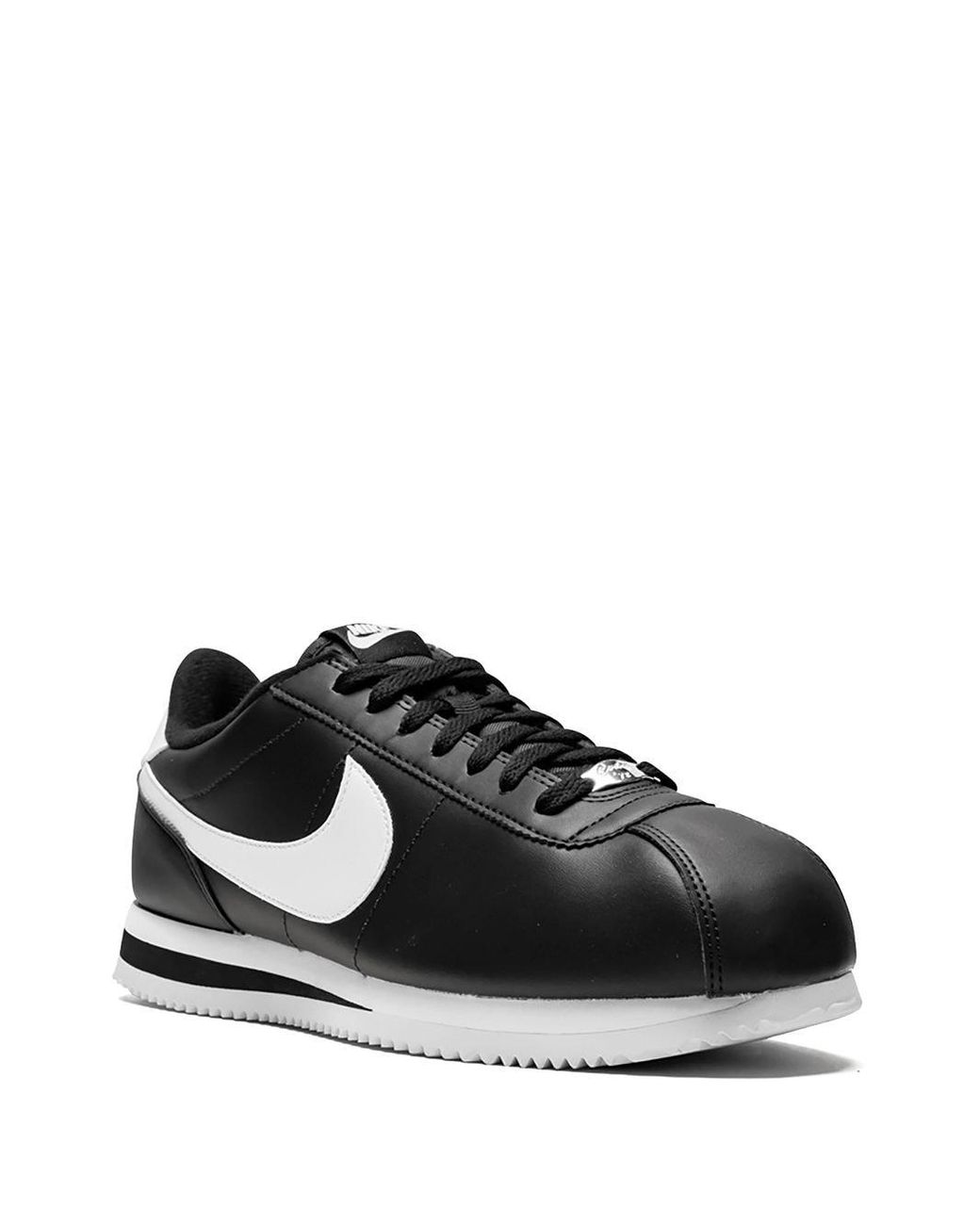 white and black cortez mens